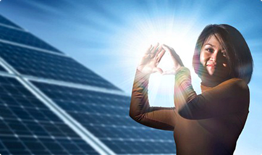 Woman Smiling Woman in The Sun Next to Solar Panels