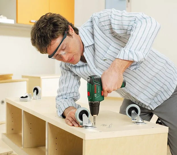 Greenwich furniture fitter assembling ottoman storage bed frame